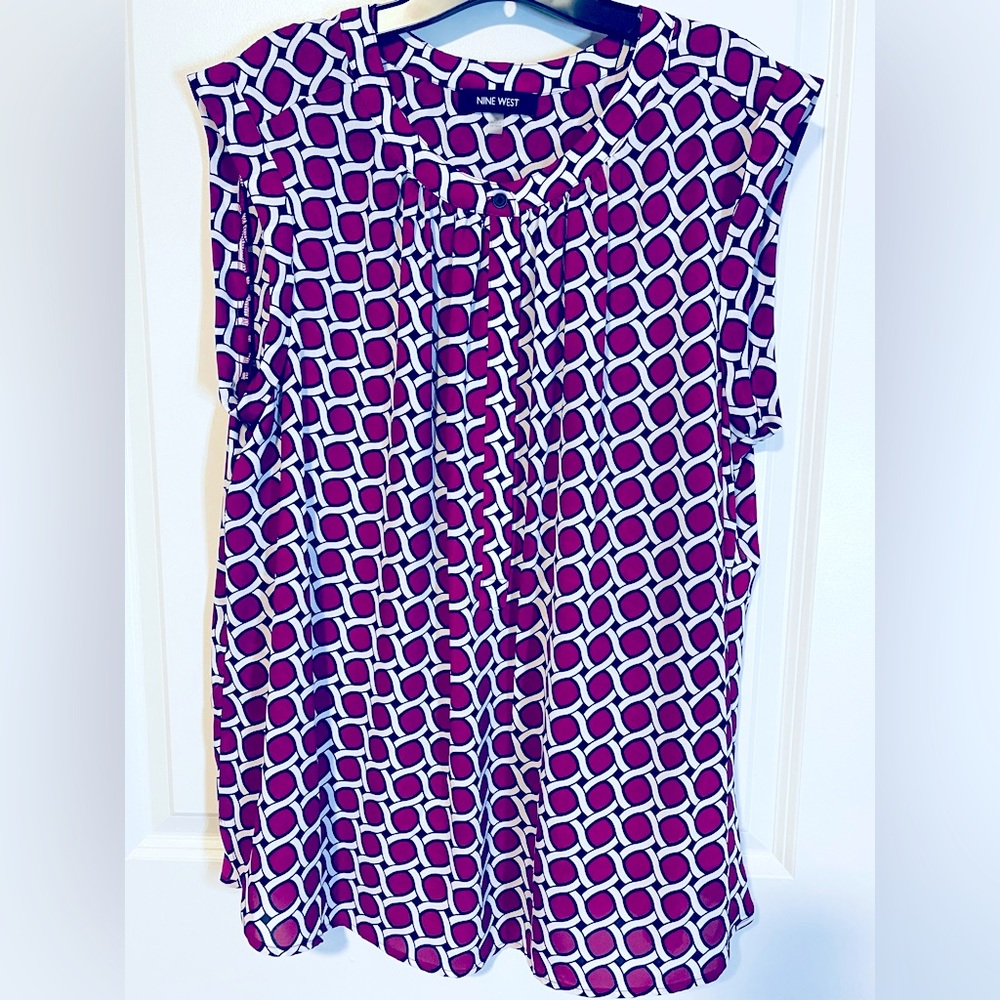 Nine West sleeveless top with raspberry and white print.